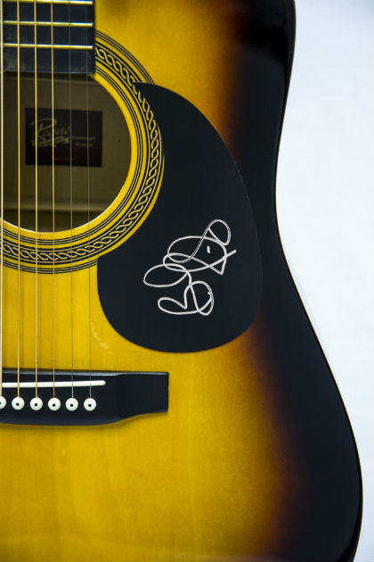 Rock Stars’ Autographed Guitars From Hungerthon