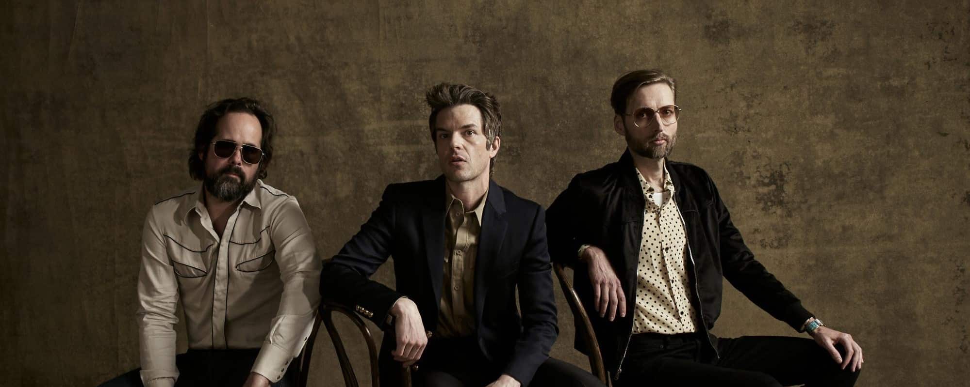 The Killers Drop Surprise Deluxe Version of ‘Imploding The Mirage’ Featuring New Song “C’est La Vie”