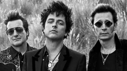Green Day, known for their song "American Idiot," is pictured together.