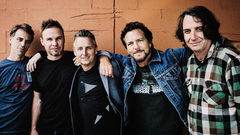 The band Pearl Jam is pictured all together with Eddie Vedder.