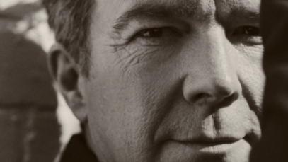 Ricky Astley is pictured looking directly at the camera 35 years after releasing "Never Gonna Give You Up."