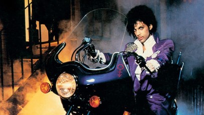 Singer Prince astride a motorcycle for his 'Purple Rain' album cover.