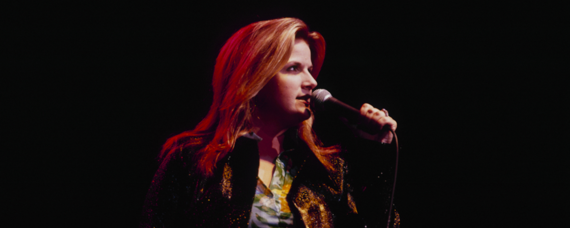 The Meaning Behind Trisha Yearwood’s Heartfelt Debut Single “She’s in Love With the Boy”