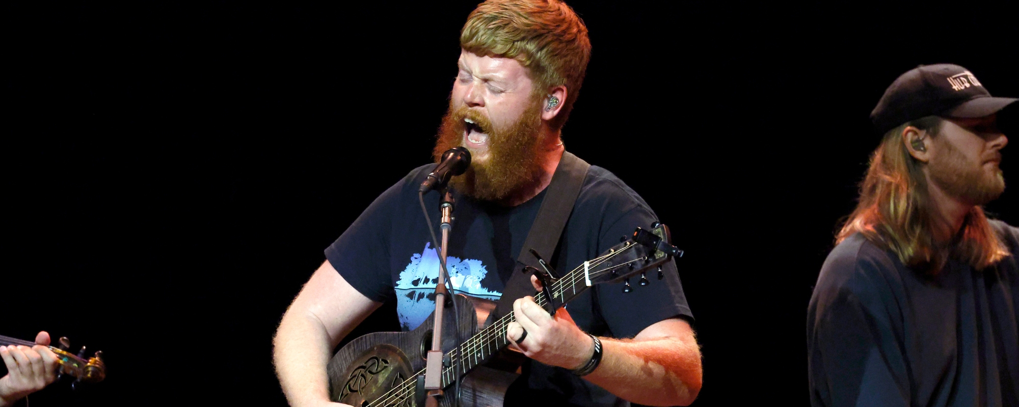 Oliver Anthony is surprised by country legend during Ryman debut.
