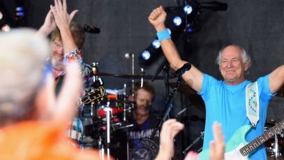 A grinning Jimmy Buffett raises his fists in the air triumphantly after performing on NBC's 'Today' in July 2016.