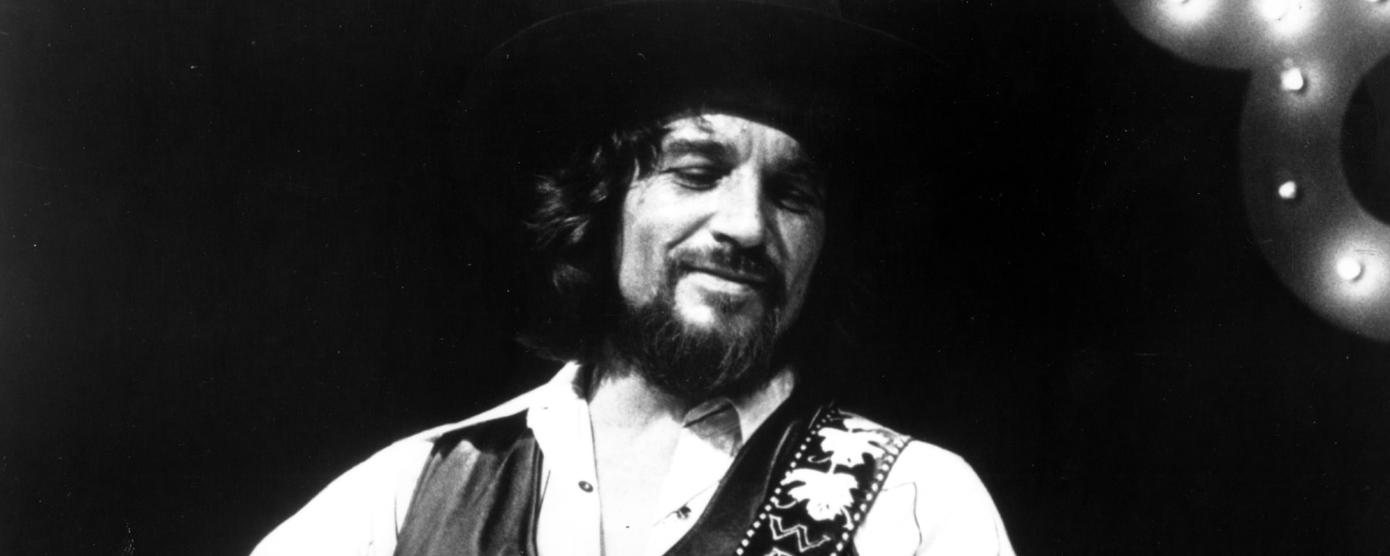 Waylon Jennings performs onstage wearing a cowboy hat with a Fender Telecaster electric guitar on June 2, 1983 in Los Angeles, California.