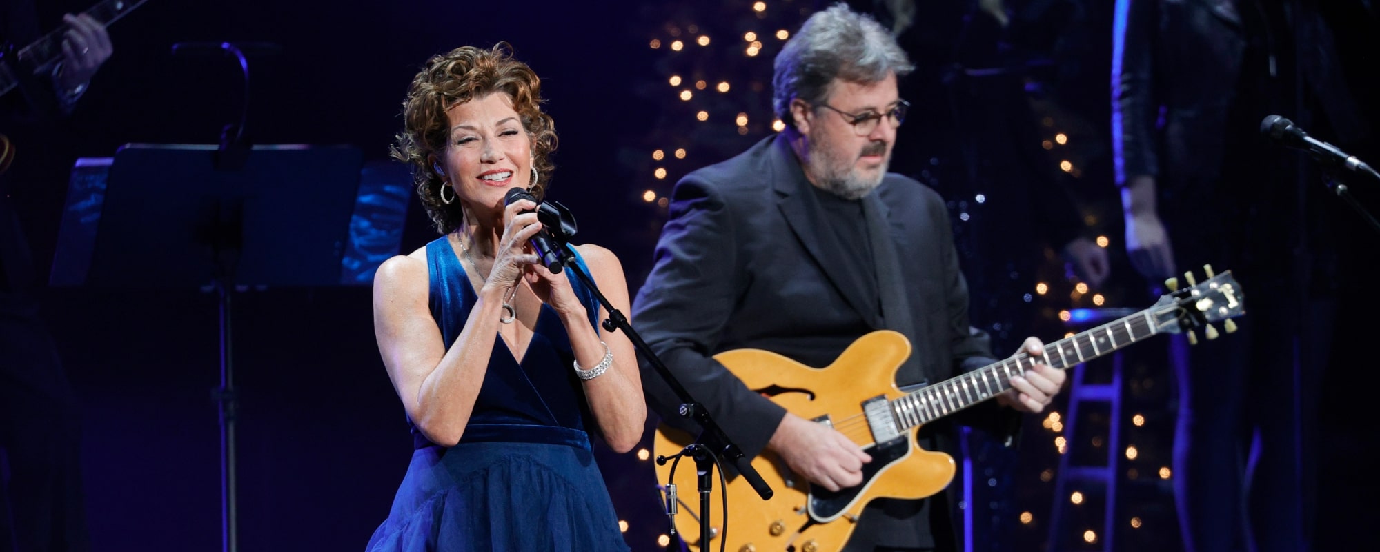 Amy Grant and Vince Gill perform at the Ryman Auditorium on December 13, 2021 in Nashville, Tennessee.