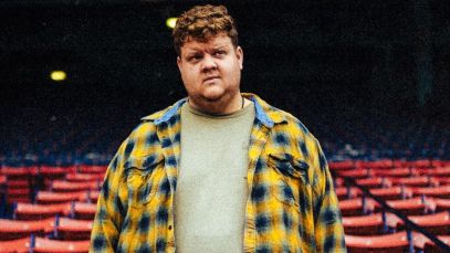 Dan Spencer standing in Fenway Park