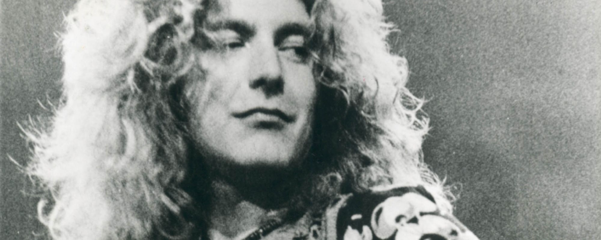 Robert Plant looking off to one side