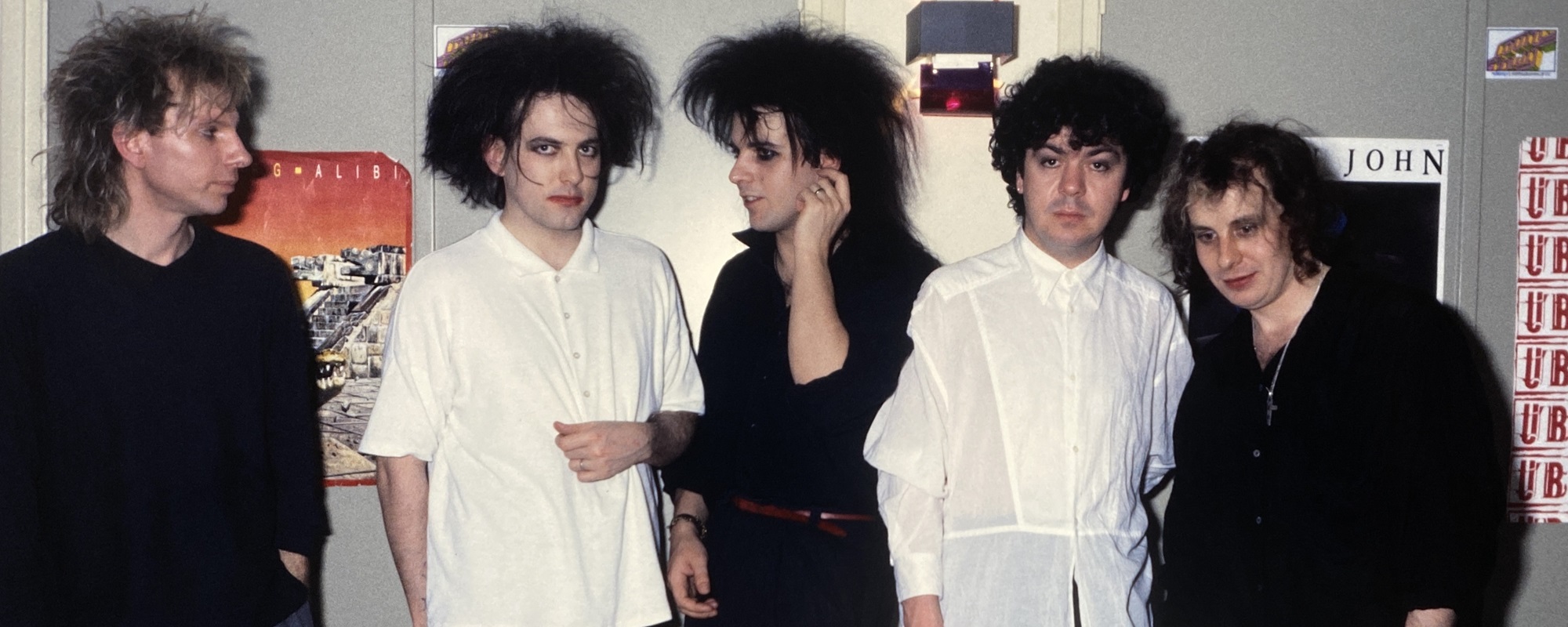 British new wave group The Cure members Robert Smith, Lol Tolhurst, Porl Thompson, Simon Gallup, Boris Williams
