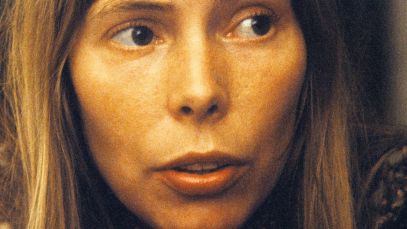 Joni Mitchell looking to the side