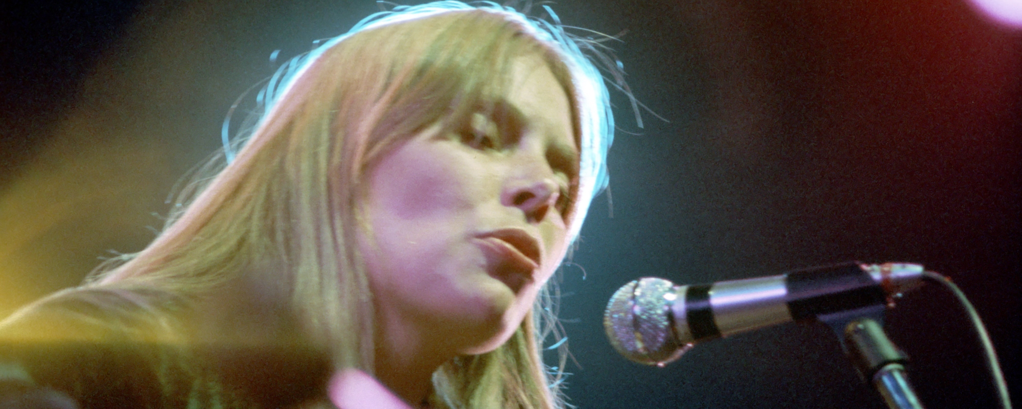 The Story Behind “Woodstock,” the Song Joni Mitchell Wrote About the Festival She Didn’t Attend