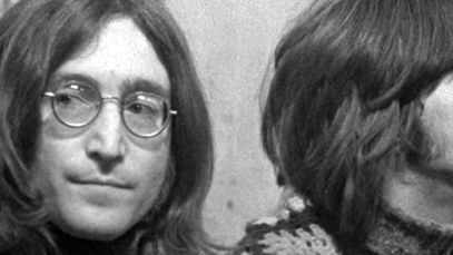 John Lennon and Eric Clapton sitting together
