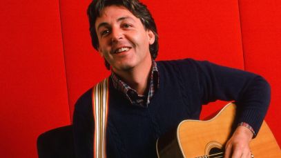 Paul McCartney playing guitar