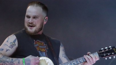 Watch Zach Bryan Welcome Tulsa Fan to the Stage for Special Performance of "Heading South"