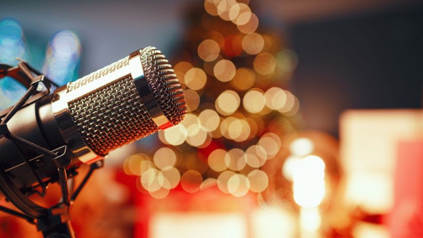 Radio mic with Christmas decorations in back