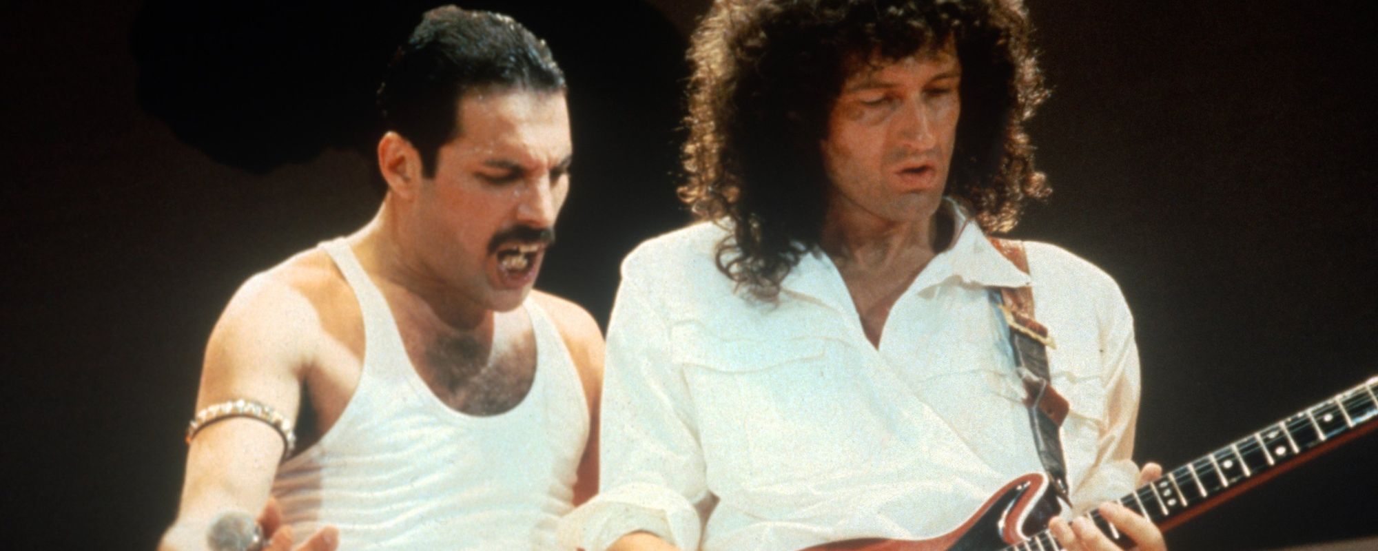Freddie Mercury and Brian May of Queen performing
