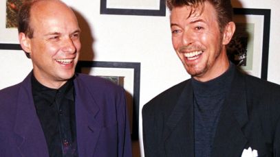 Brian Eno and David Bowie standing together