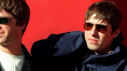 Noel and Liam Gallagher standing together