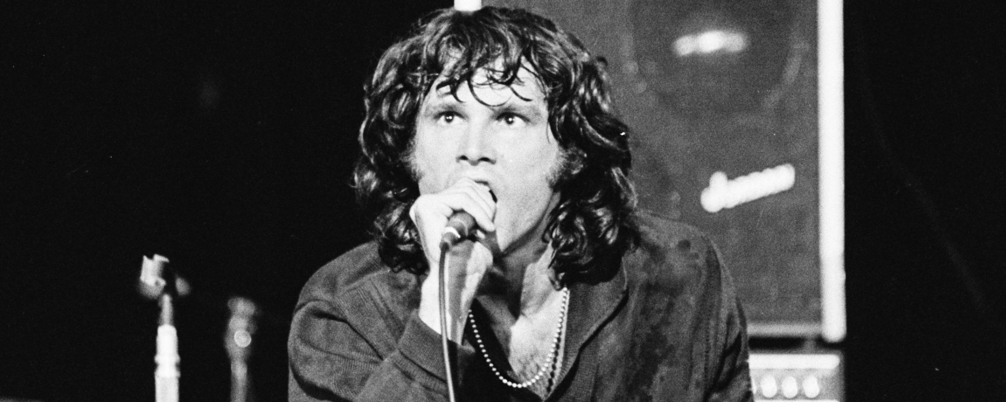 Jim Morrison performing