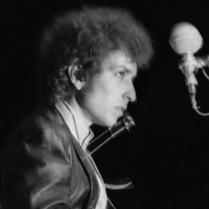 Bob Dylan performing at Newport Folk Festival