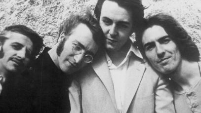 Beatles posing together