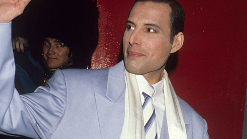 Freddie Mercury waving