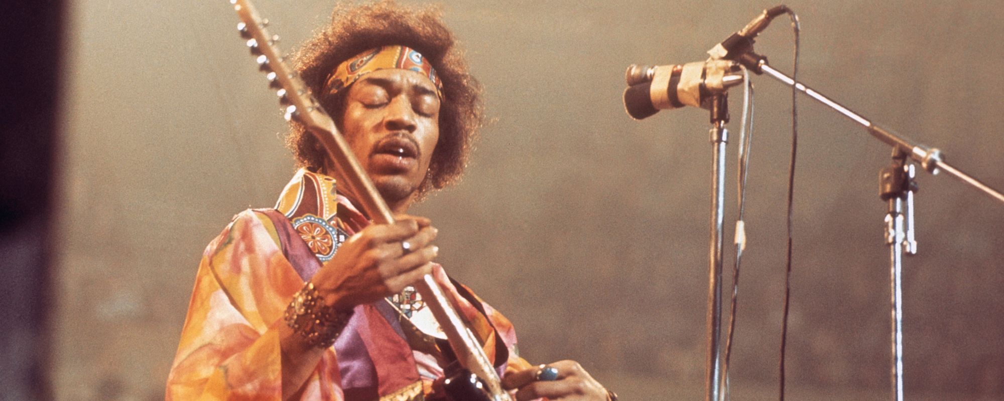 Jimi Hendrix performing