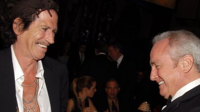 Keith Richards and Lorne Michaels standing together, laughing