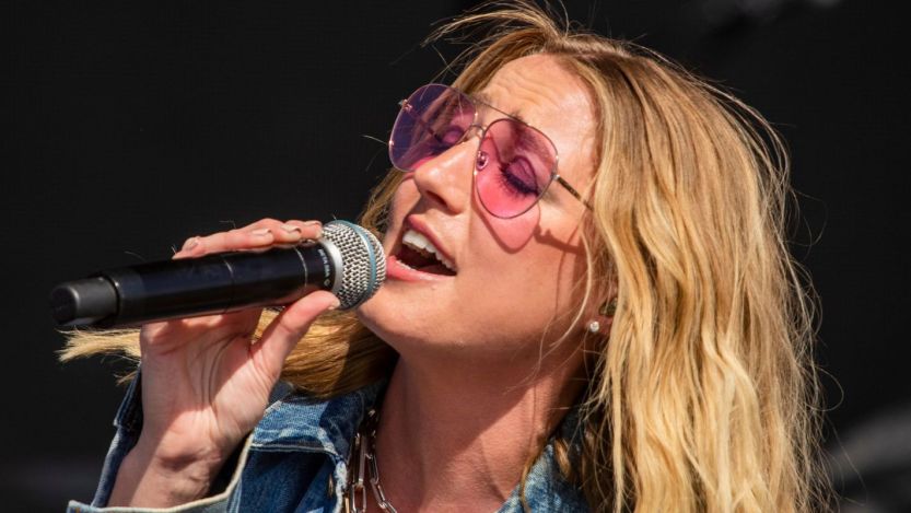 "We're Back Baby:" Ingrid Andress Makes Triumphant National Anthem Return After Viral Home Run Derby Performance