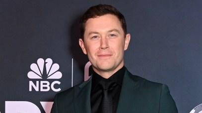 Watch Scotty McCreery Fall on Stage While Opening for Kane Brown: "Who Put That There"