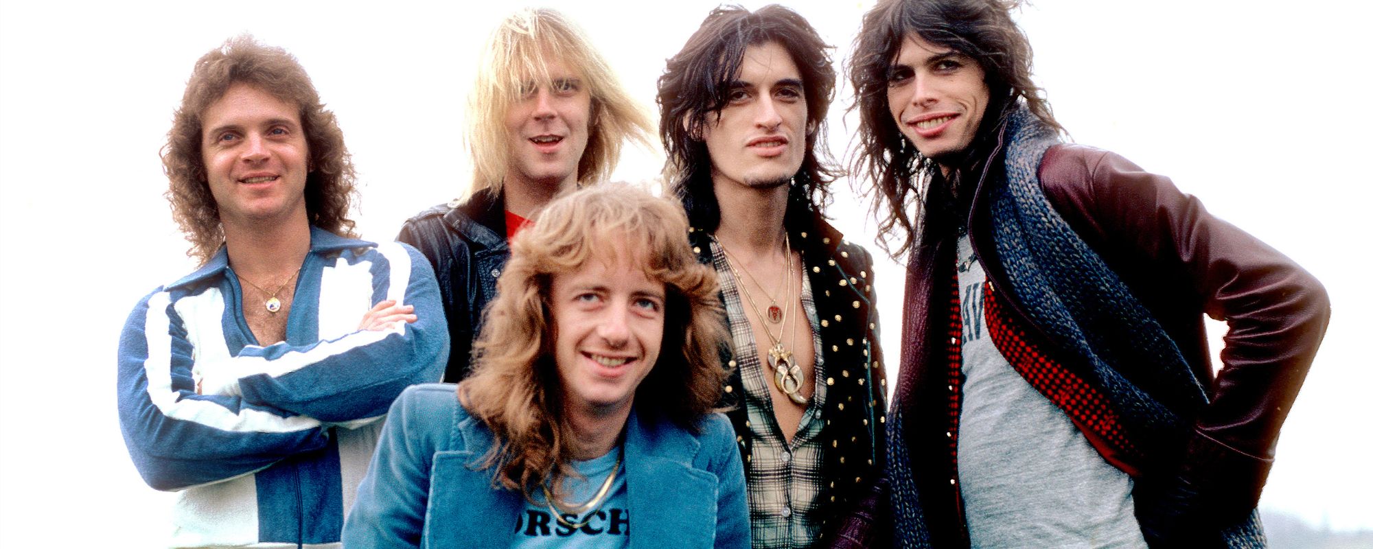 Aerosmith band posing together