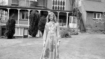 Musical icon David Bowie in front of historic home from the 1970s