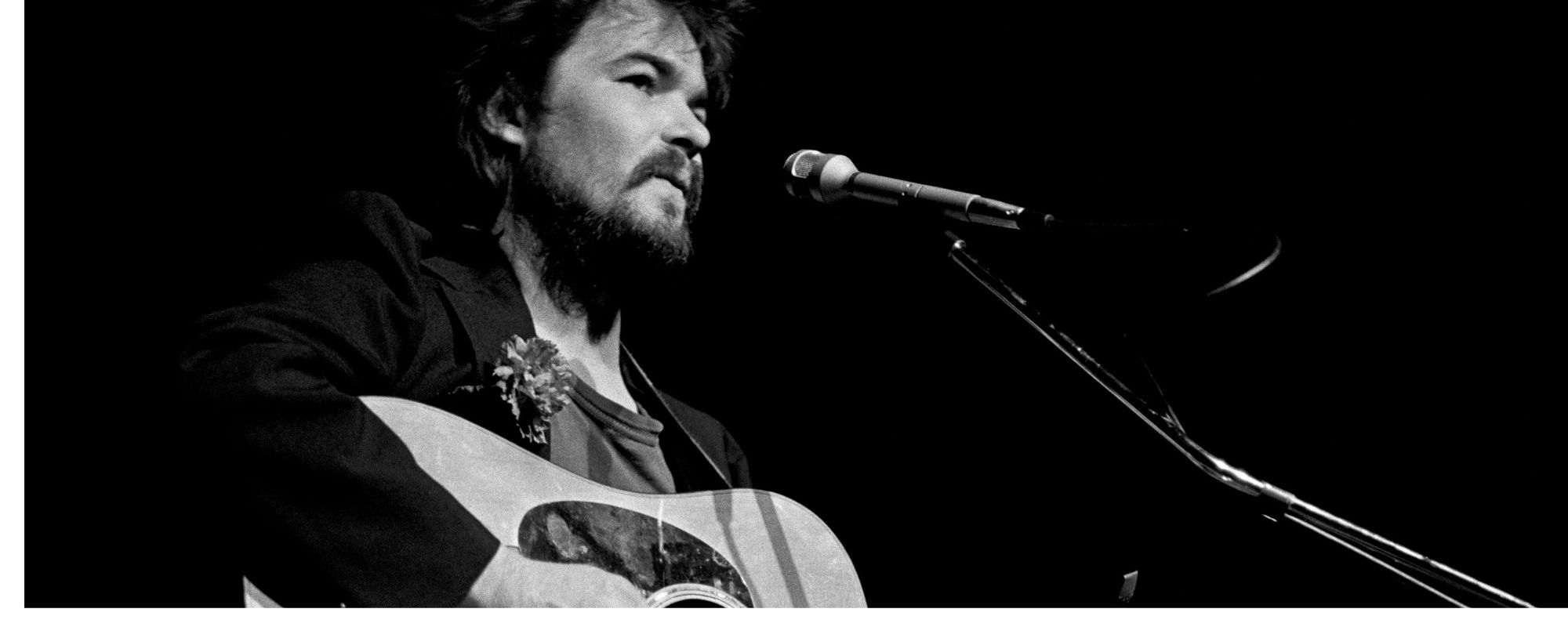John Prine performing, 1970s folk singer