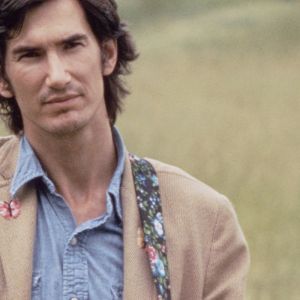Townes Van Zandt standing in field