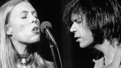 Joni Mitchell and Neil Young performing