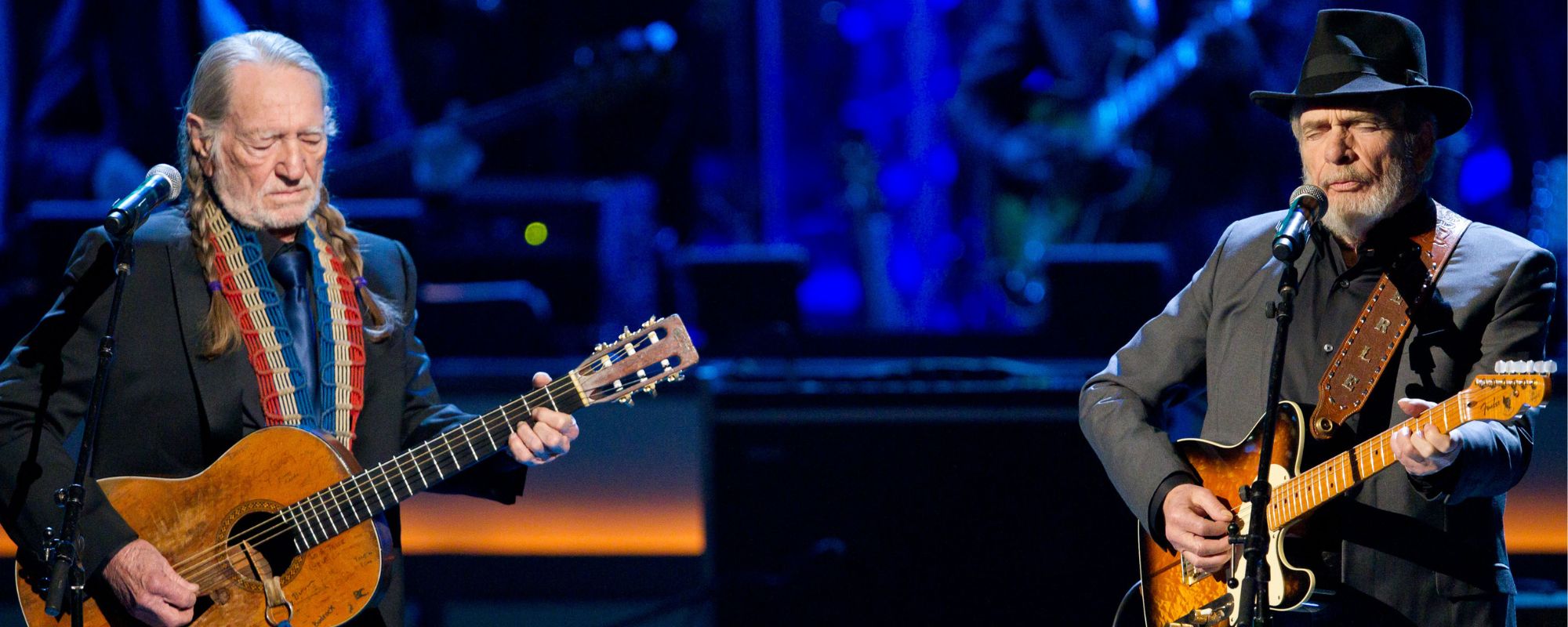 Willie Nelson and Merle Haggard performing