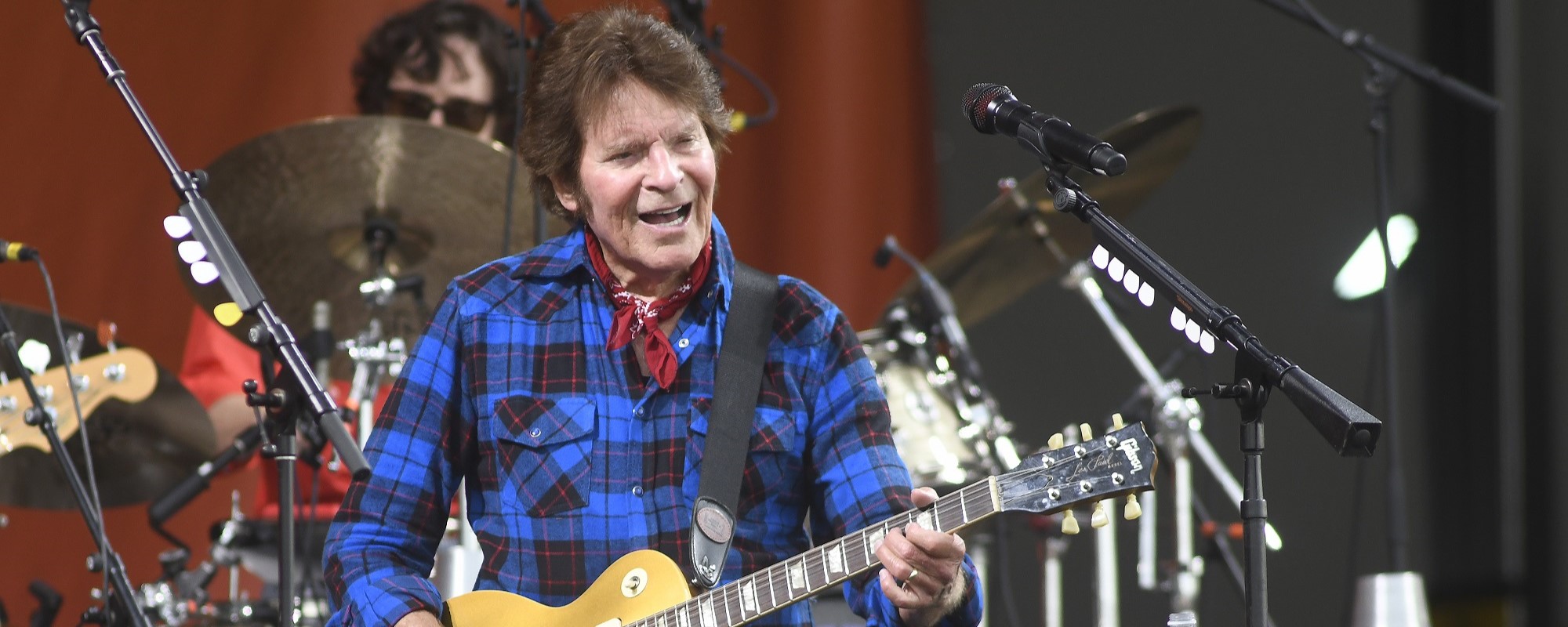 Find Out What Inspired John Fogerty to Start Playing CCR Songs in Concert Again in 1987 After Years of Refusing to Do So