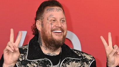 Jelly Roll Celebrates Brandon Lake Collaboration on "Hard Fought Hallelujah" With Some New Ink