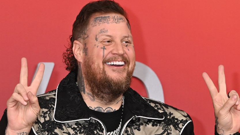 Jelly Roll Celebrates Brandon Lake Collaboration on "Hard Fought Hallelujah" With Some New Ink