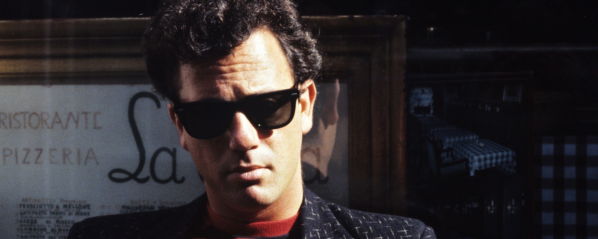 Watch Billy Joel and His Band Deliver a Pitch-Perfect A Cappella Version of “The Longest Time” in 1984 in a Locker Room Shower