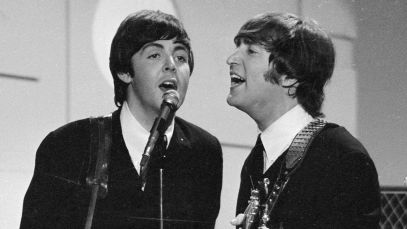Paul McCartney and John Lennon performing