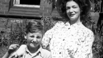 John Lennon's mother, Julia Lennon, posing with young John