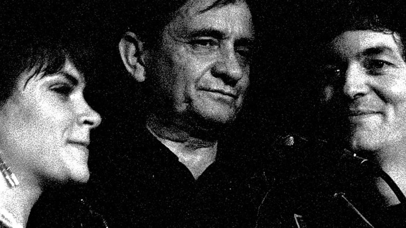 Rosanne Cash, Johnny Cash, and Rodney Crowell standing together