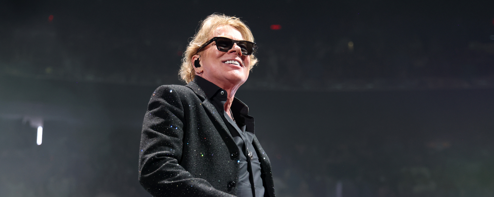 Axl Rose Throws a Mic, Kicks Isaac Carpenter’s Drum Kit at Guns N’ Roses Concert