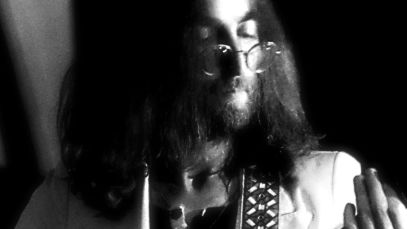 John Lennon performing