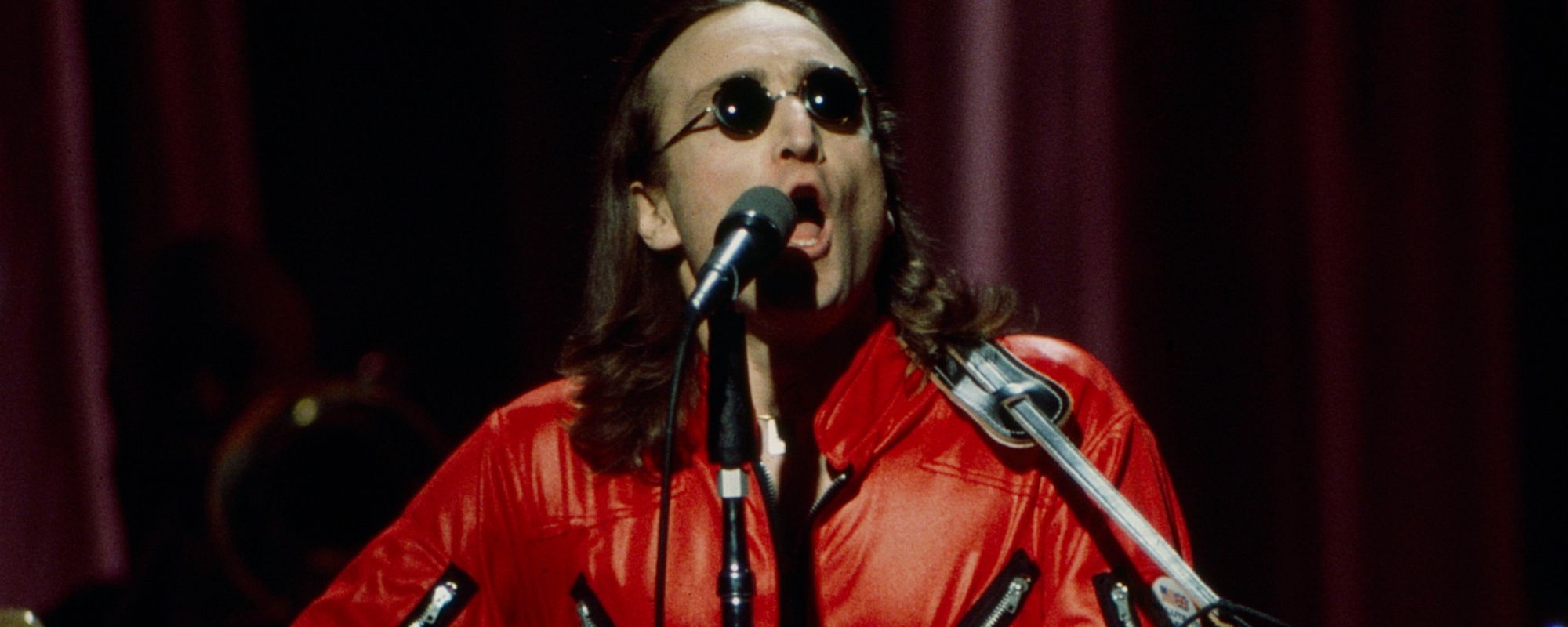 John Lennon performing