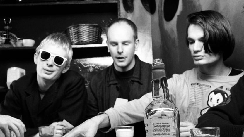 Radiohead sitting at table