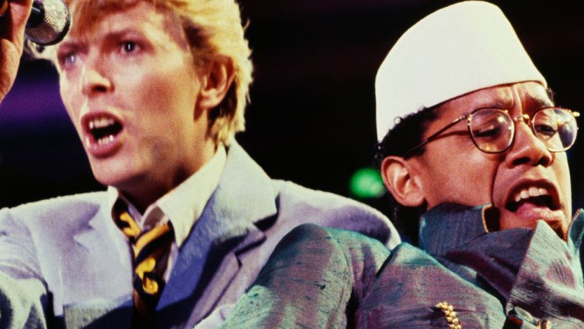 David Bowie and Carlos Alomar performing