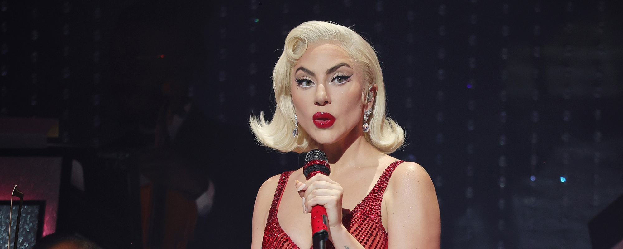 Lady Gaga Pauses Show After Dancer Slips and Falls Off Stage Amid Pouring Rain